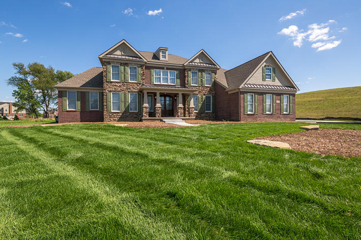 Brick Home with Tudor Williamsburg